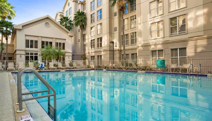 Outdoor Pool at Homewood Suites by Hilton Orlando-International DriveConve