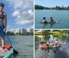 Three people are stand-up paddleboarding on a calm river with clear water and lush greenery in the background