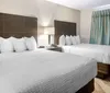 Photo of Clarion Inn  Suites Kissimmee Lake Buena Vista South Room