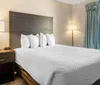 Photo of Clarion Inn  Suites Kissimmee Lake Buena Vista South Room