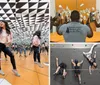 Two women are laughing and posing for a photo in a mirrored room that creates an infinite reflection effect