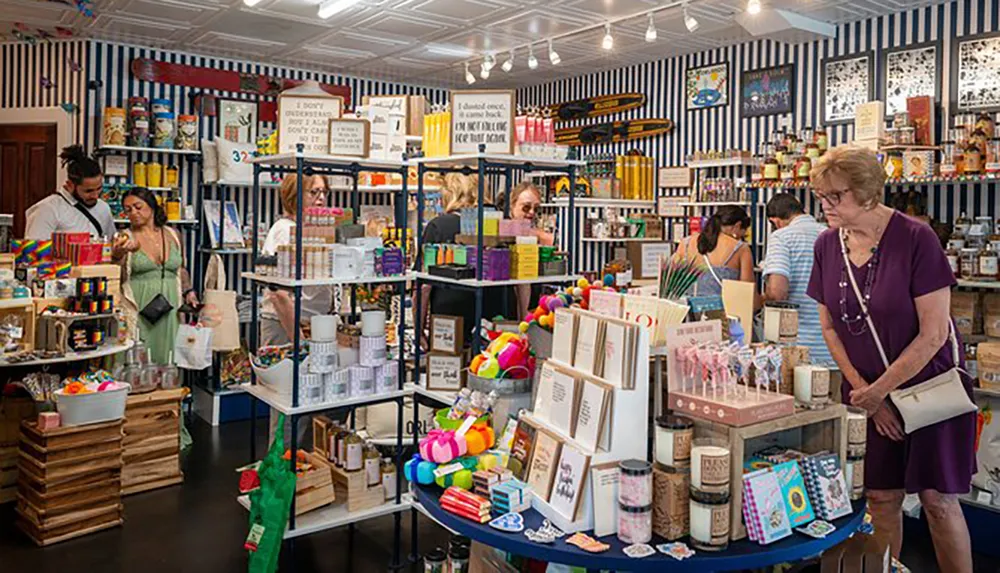 Customers browse various items in a bright and colorful boutique gift shop