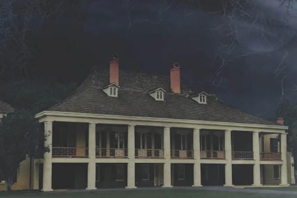 The image shows a large two-story house with a dark and eerie atmosphere featuring a symmetrical facade with columns and a balcony set against a night sky