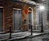 The image depicts a moody grayscale street scene with selective color highlighting a gloomy alleyway illuminated by a single street lamp in a possibly historical or aged urban environment