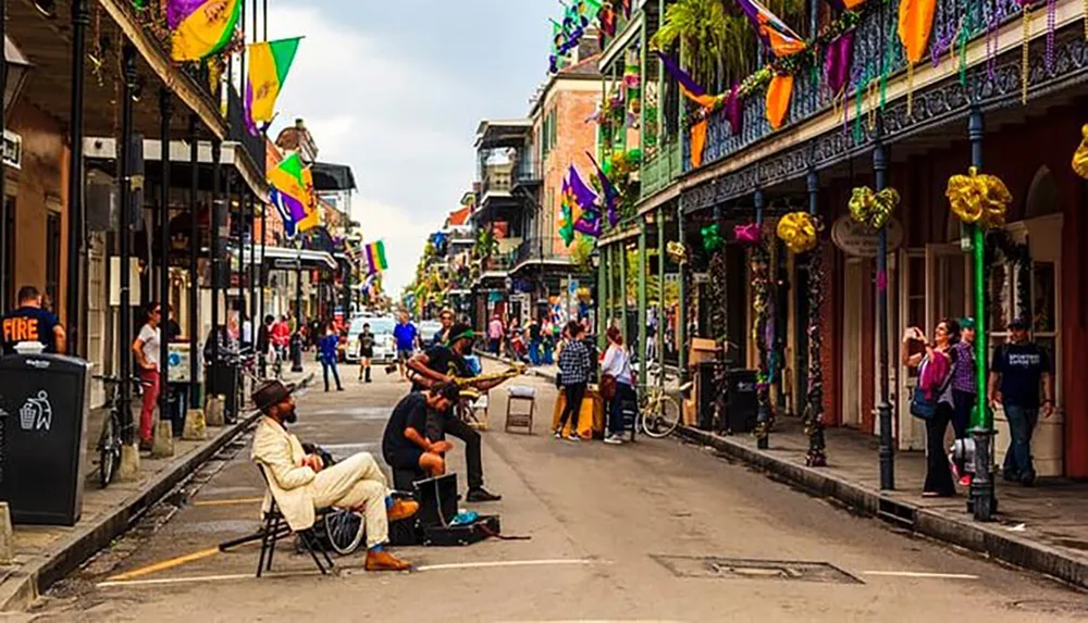 This image depicts a vibrant street scene with people and musicians festooned with Mardi Gras decorations suggesting it may be in New Orleans French Quarter
