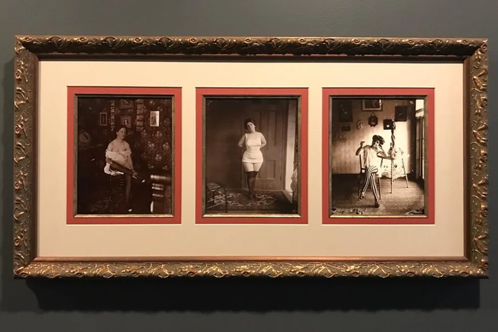 The image shows a framed triptych of sepia-toned photographs each depicting a different woman in a vintage interior setting with an ornate gold frame surrounding the three images