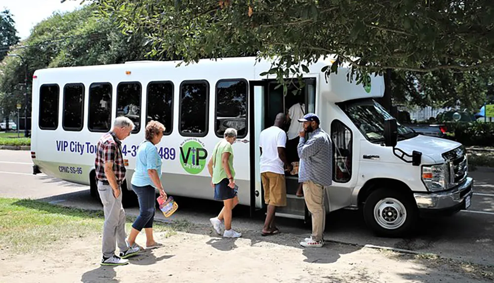 Passengers are boarding a VIP City Tours shuttle bus on a sunny day