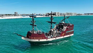 A modern replica of a pirate ship labeled 