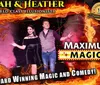 The image depicts a promotional poster featuring two illusionists named Noah and Heather touting their Maximum Magic show which includes award-winning magic and comedy all framed by dramatic fiery visuals