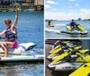 A person is energetically posing with a peace sign while seated on a green and white Yamaha WaveRunner on the water
