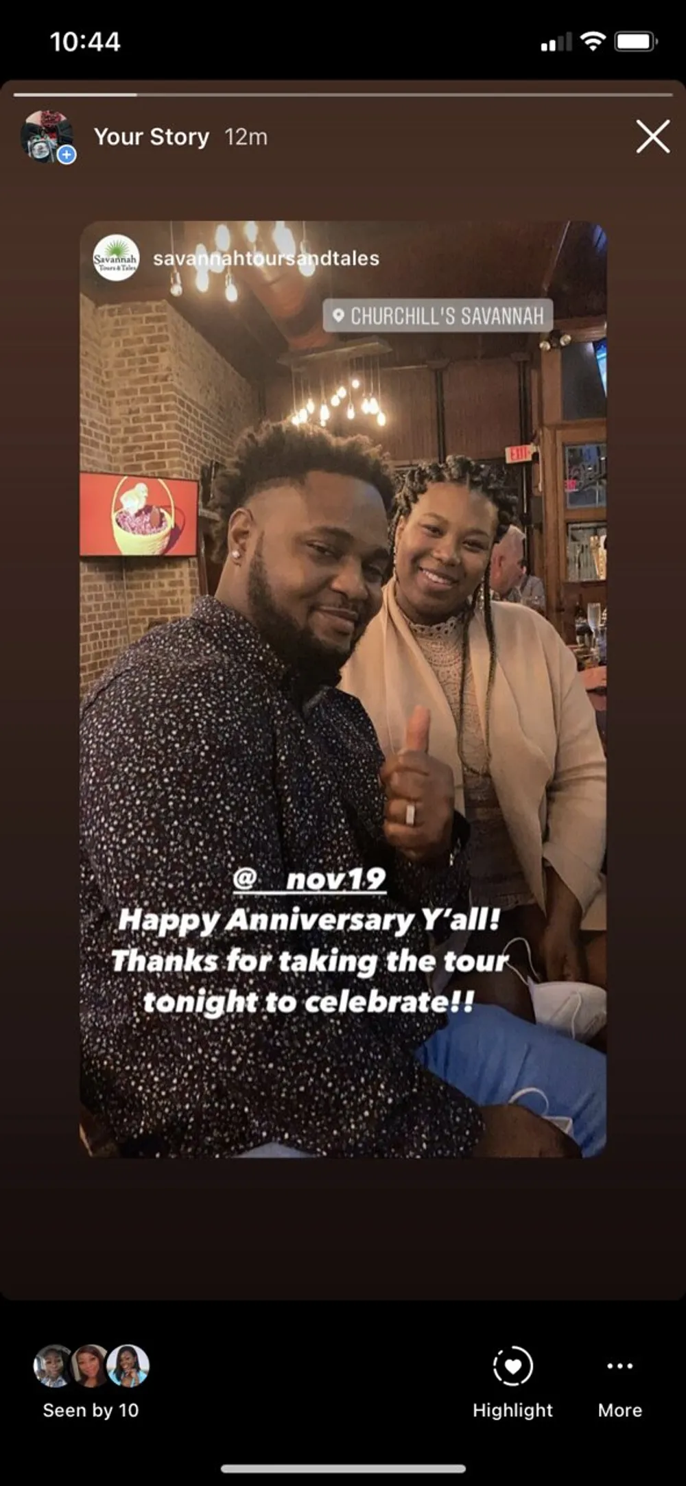 A screenshot of a social media story features two smiling individuals with a caption celebrating their anniversary and thanking them for taking a tour to commemorate the occasion