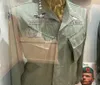 The image displays a mannequin dressed in a military uniform with a name tag reading WESTMORELAND adorned with US Army patches and generals stars on the hat
