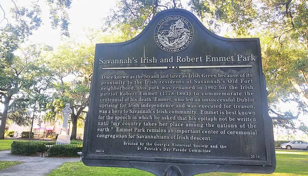 The image shows a historical marker for Savannahs Irish and Robert Emmet Park which details the parks renaming in honor of the Irish patriot Robert Emmet and its importance to the local Irish community