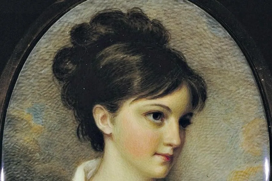 The image depicts a classical portrait of a young woman with dark hair styled in an updo, a delicate complexion, and soft, thoughtful eyes, framed within an oval border.