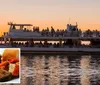 A multi-deck tour boat is filled with passengers enjoying a scenic sunset cruise on calm waters