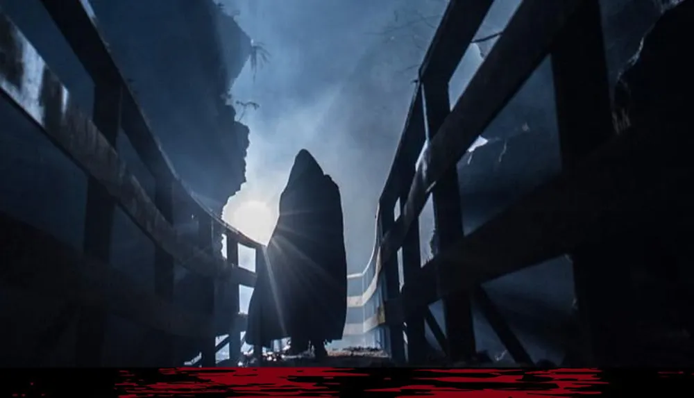 The image shows a silhouetted figure standing between ruined structures with beams of light shining from behind creating a dramatic and eerie atmosphere