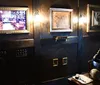 Four people are posing with humorous signs indicating their different experiences after solving an escape room challenge themed around a stolen relic