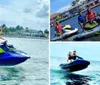 Two people are enjoying a jet ski ride on a sunny day with waterfront houses in the background