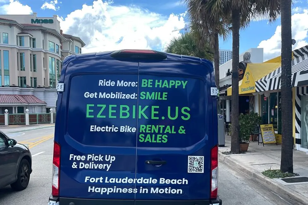 The image shows a blue van advertising EZEBIKE electric bike rentals and sales with emphasis on happiness and mobility parked on a sunny street possibly in Fort Lauderdale Beach given the contextual cues and text