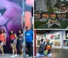 A group of cheerful people is posing with various playful gestures in front of a colorful and artistic mural with animated characters and floral designs