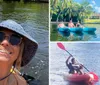 Three individuals are enjoying their time on a kayak in a scenic waterway surrounded by palm trees and waterfront properties