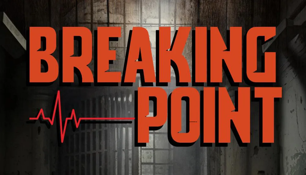 The image shows the text BREAKING POINT in large orange letters with a red heartbeat line running through the text set against a dark ominous backdrop that appears to be a dilapidated cell or industrial space