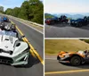 The image shows two Polaris Slingshot three-wheeled vehicles driving down a scenic road with passengers wearing helmets
