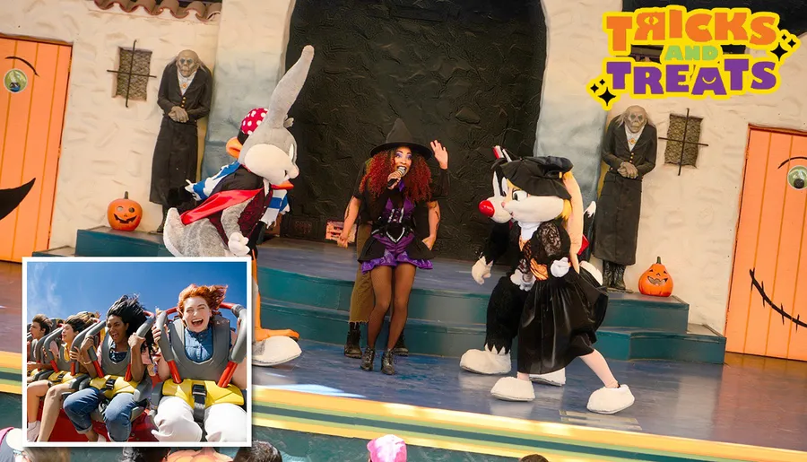 A festive Halloween-themed performance is taking place on stage with costumed characters and decorations, while an inset shows people enjoying a roller coaster ride.