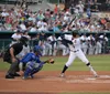 The collage depicts various scenes from a baseball game featuring players in white uniforms with Missions on the front capturing actions such as pitching batting team celebration and a view of the game with spectators in the stands