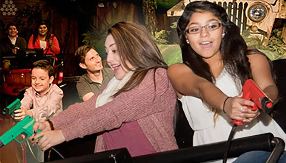 A group of people including children and adults are enjoying a ride at an amusement park with some holding laser blasters suggesting an interactive element to the experience