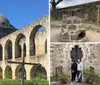 The image shows the historical architecture of an old stone mission with a dome and arches under a clear blue sky