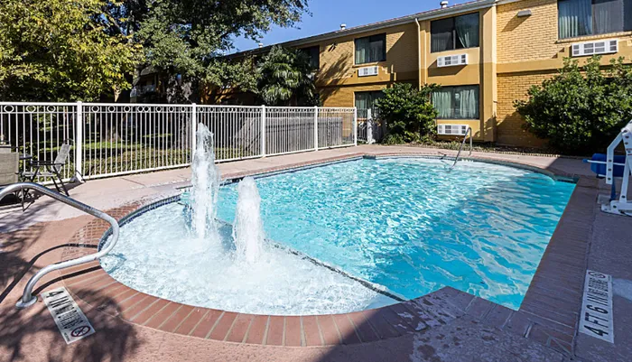 Outdoor Pool at SureStay Plus Hotel by Best Western San Antonio North