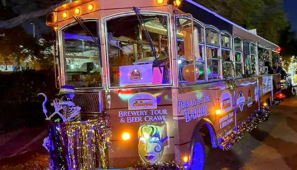 The image shows a decorated trolley bus at night festooned with lights and Mardi Gras-themed adornments promoting a brewery tour and beer crawl
