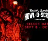 This image is a promotional poster for Busch Gardens Howl-O-Scream event in Tampa Bay featuring a spooky figure in a hooded costume with a skull-like mask set against a backdrop of eerie red lighting and Halloween decorations