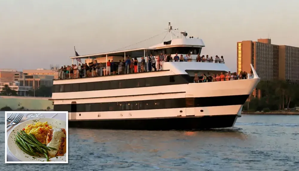 A large passenger boat filled with people is cruising near the shore with an inset image showing a plate of food featuring green beans rice and fish