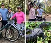 Three people are standing on a wooded trail with their bicycles smiling for the camera