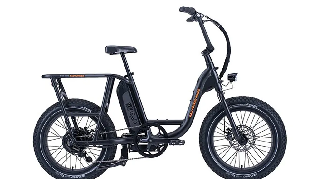 The image shows a modern electric fat-tire bicycle with a large battery pack mounted on the frame