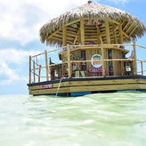 Tiki Boat - St. Pete Pier - The Only Authentic Floating Tiki Bar