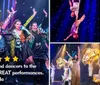 A group of lively performers are dancing on stage in colorful outfits with vibrant lighting effects in the background