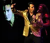A performer in a gold jacket sings on stage with background images while an inset shows a plate of mashed potatoes green beans and a meat dish with gravy