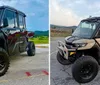 The image shows a rugged black all-terrain vehicle with large tires parked outdoors with a small inset showing an alternate view