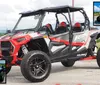 The image features a red and black off-road vehicle with two small insets showing other similar utility vehicles against a natural outdoor backdrop