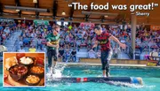 Two competitors are log rolling in a water tank in front of an audience, with a quote saying 