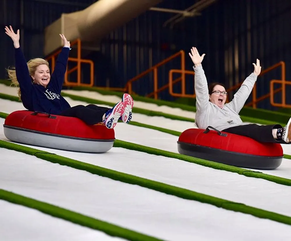 Racing with Pigeon Forge Snow Indoor Snow Tubing