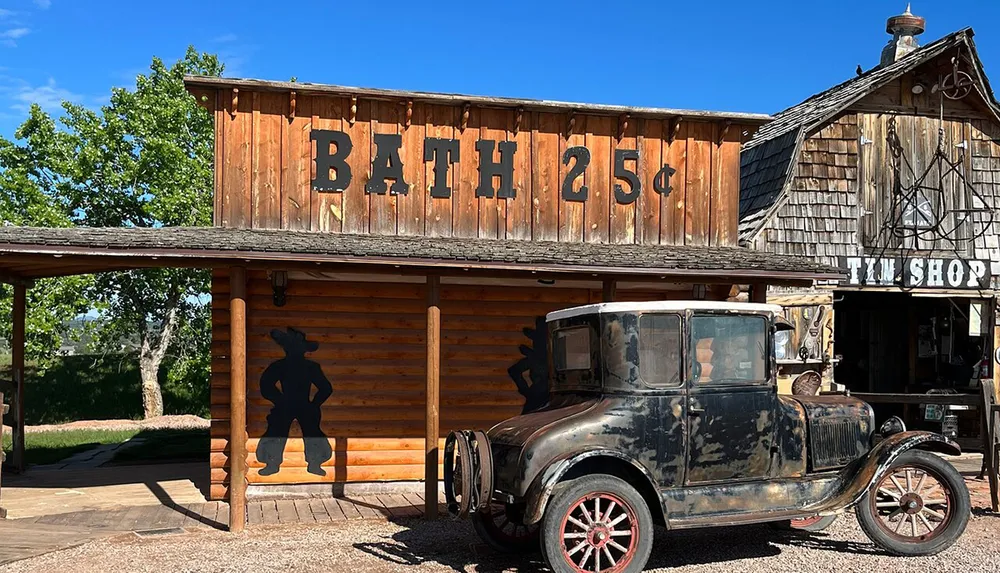 This image features a rustic wooden building with a retro BATH 25 sign above an old-fashioned car creating an ambiance reminiscent of an early 20th-century American frontier town