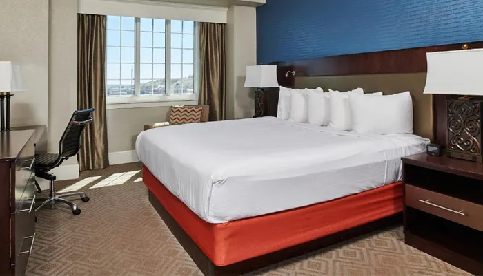 Photo of The Hotel Alex Johnson An Ascend Collection Hotel Room