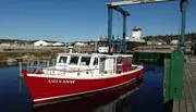 A vibrant red boat named 