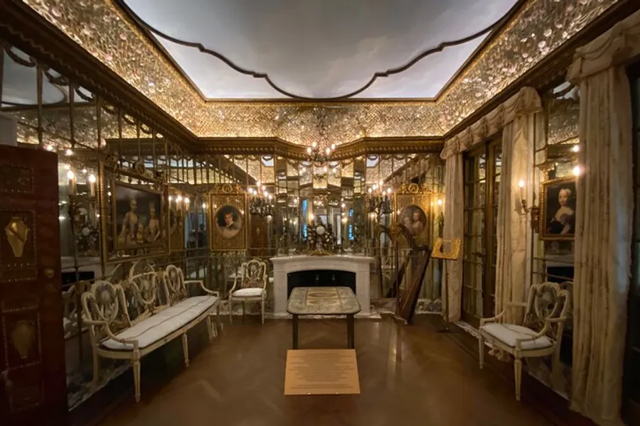 The image features an ornate room with mirrored walls, gilded furniture, elaborate lighting, and paintings, conveying a sense of historical luxury.