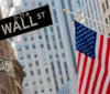 The image shows street signs for Wall Street and Broad Street in focus with an American flag displayed in the background suggesting a scene from the Financial District in New York City