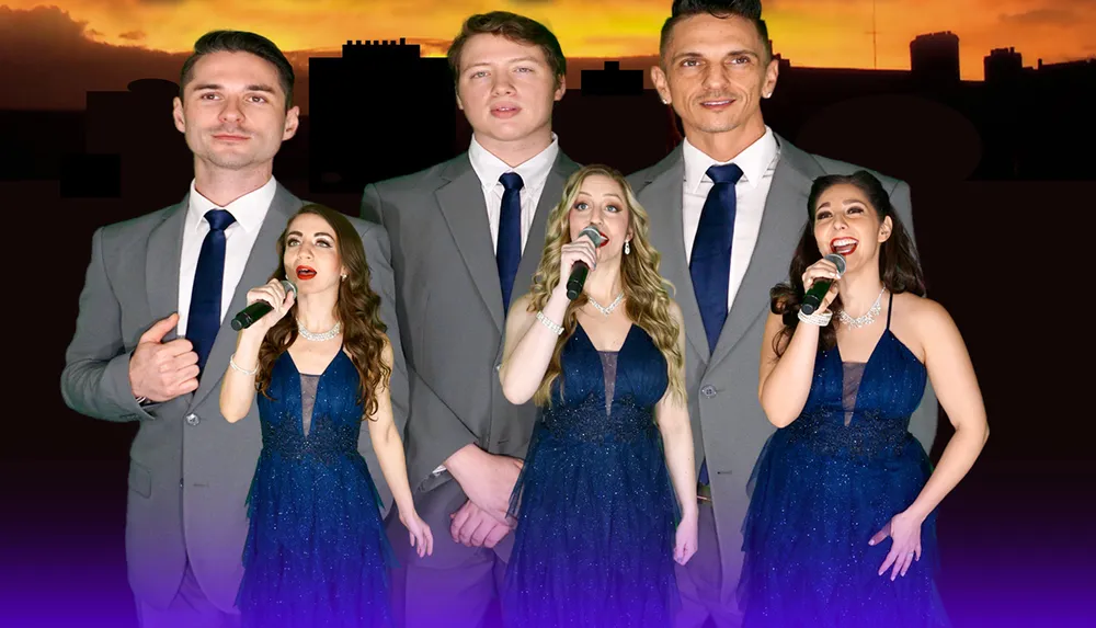 The image features a group of performers poised for a musical event with three men in suits and ties and two women in elegant blue dresses all holding microphones against a backdrop of a sunset sky